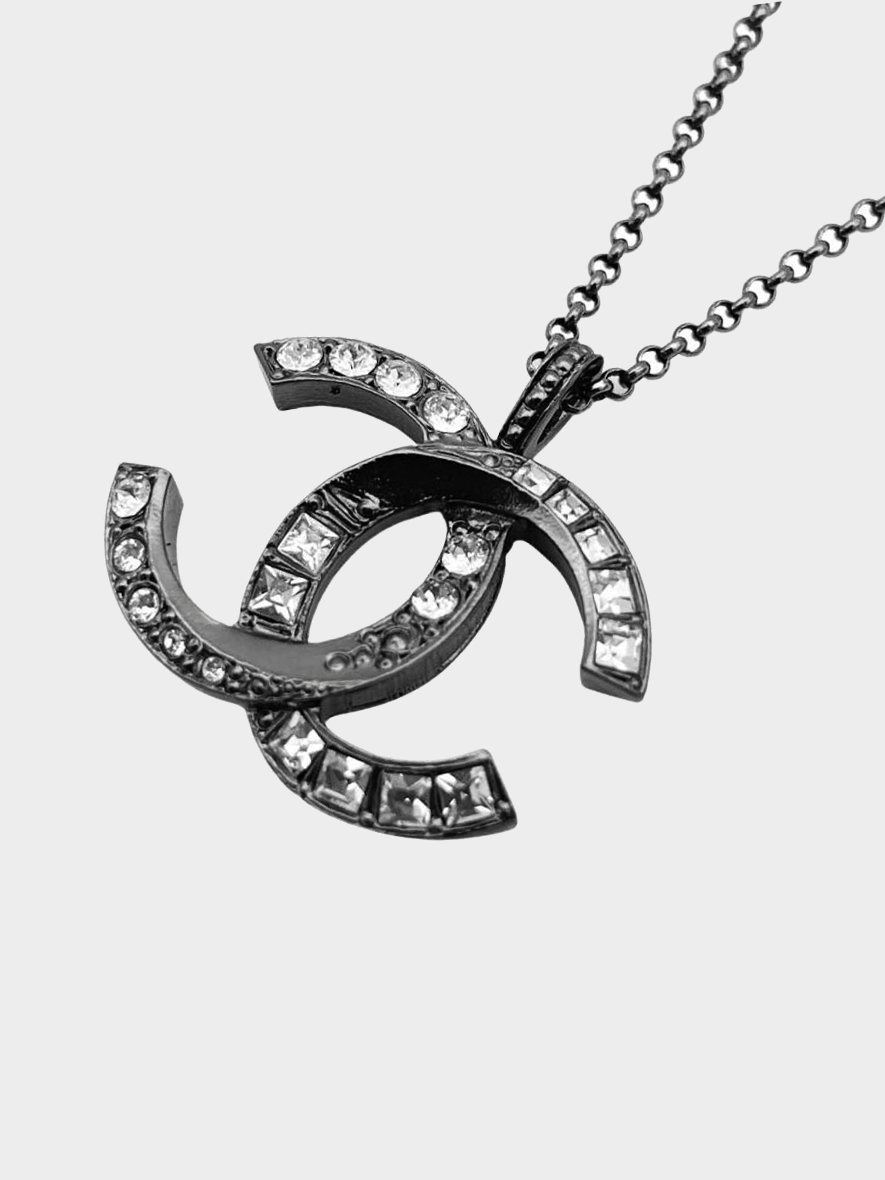 Chanel Cc Crystal Silver Tone Pendant Necklace in Metallic