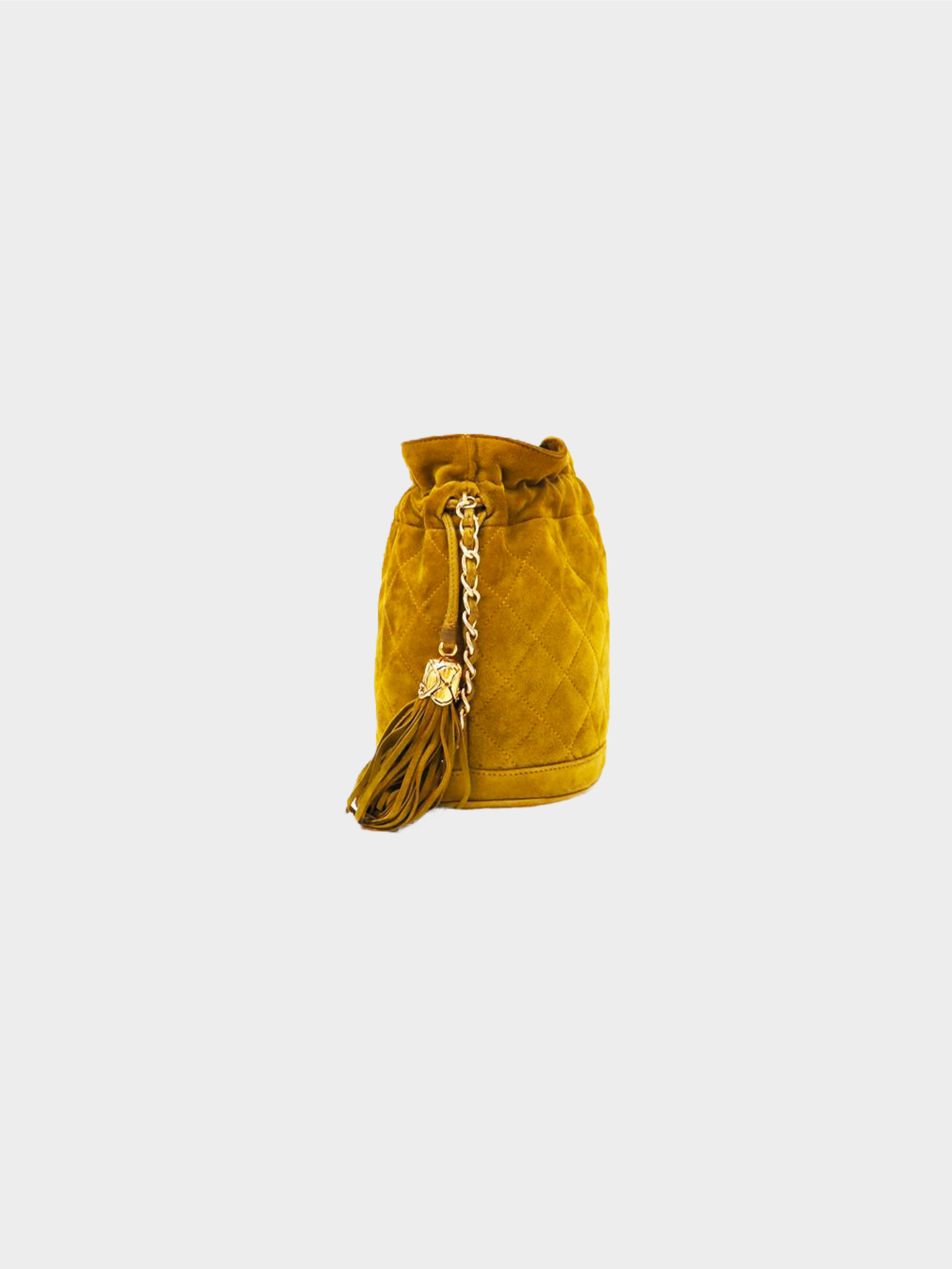 Chanel 1989-1991 Khaki Suede Drawstring Bucket Bag · INTO