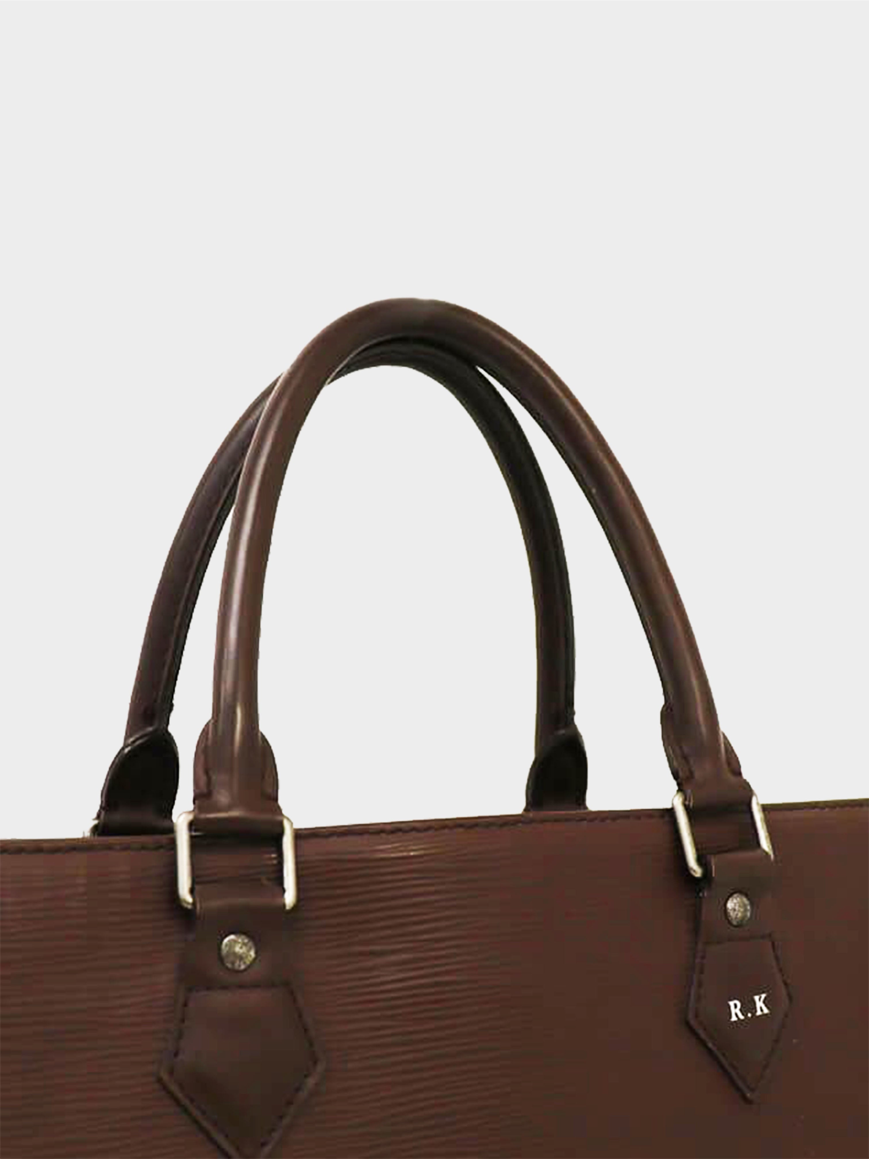 Louis Vuitton 2003 Brown Epi Line Sac Plat PM · INTO