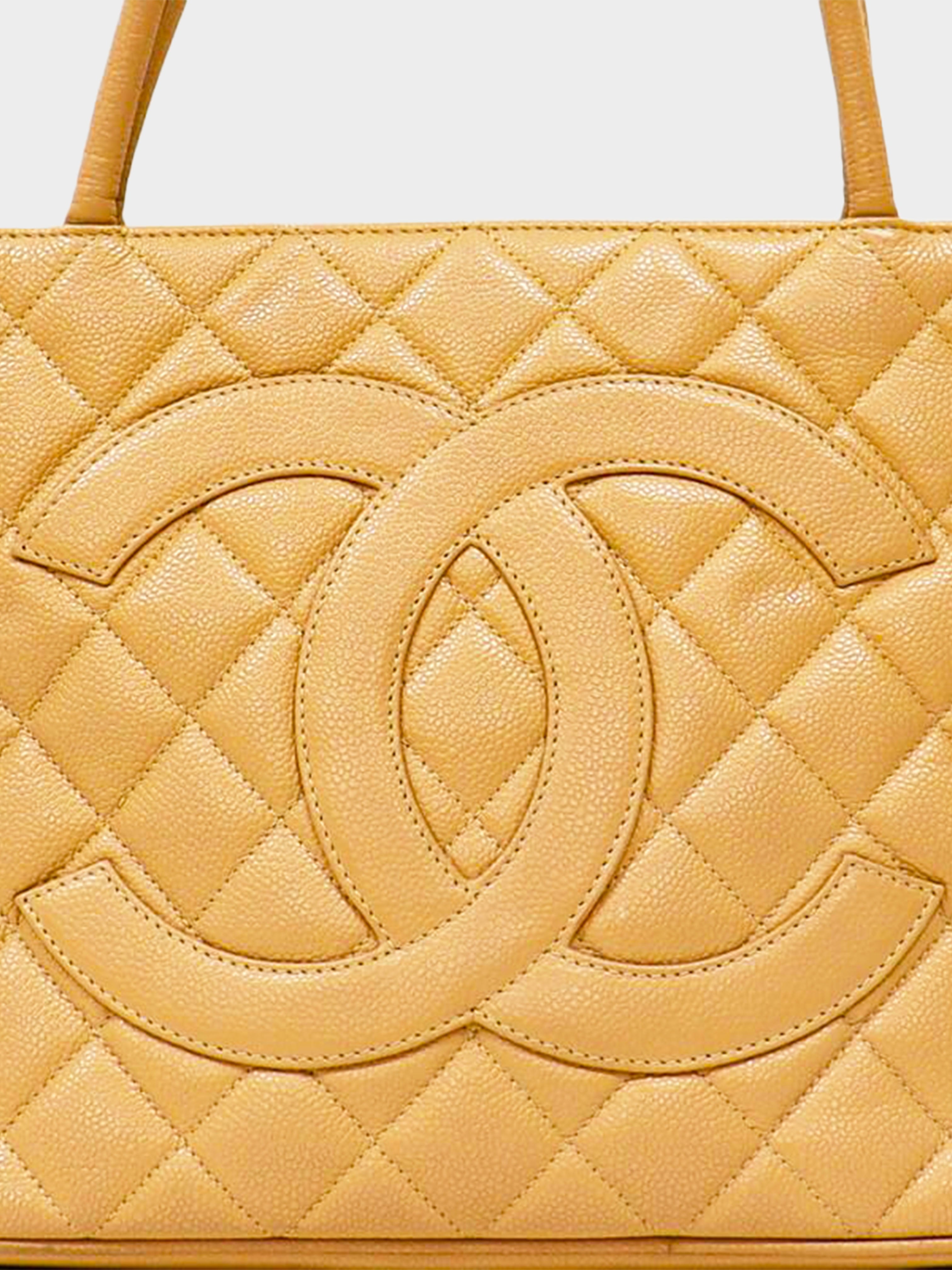 Chanel 2001-2002 COCO Caviar Skin Handbag · INTO