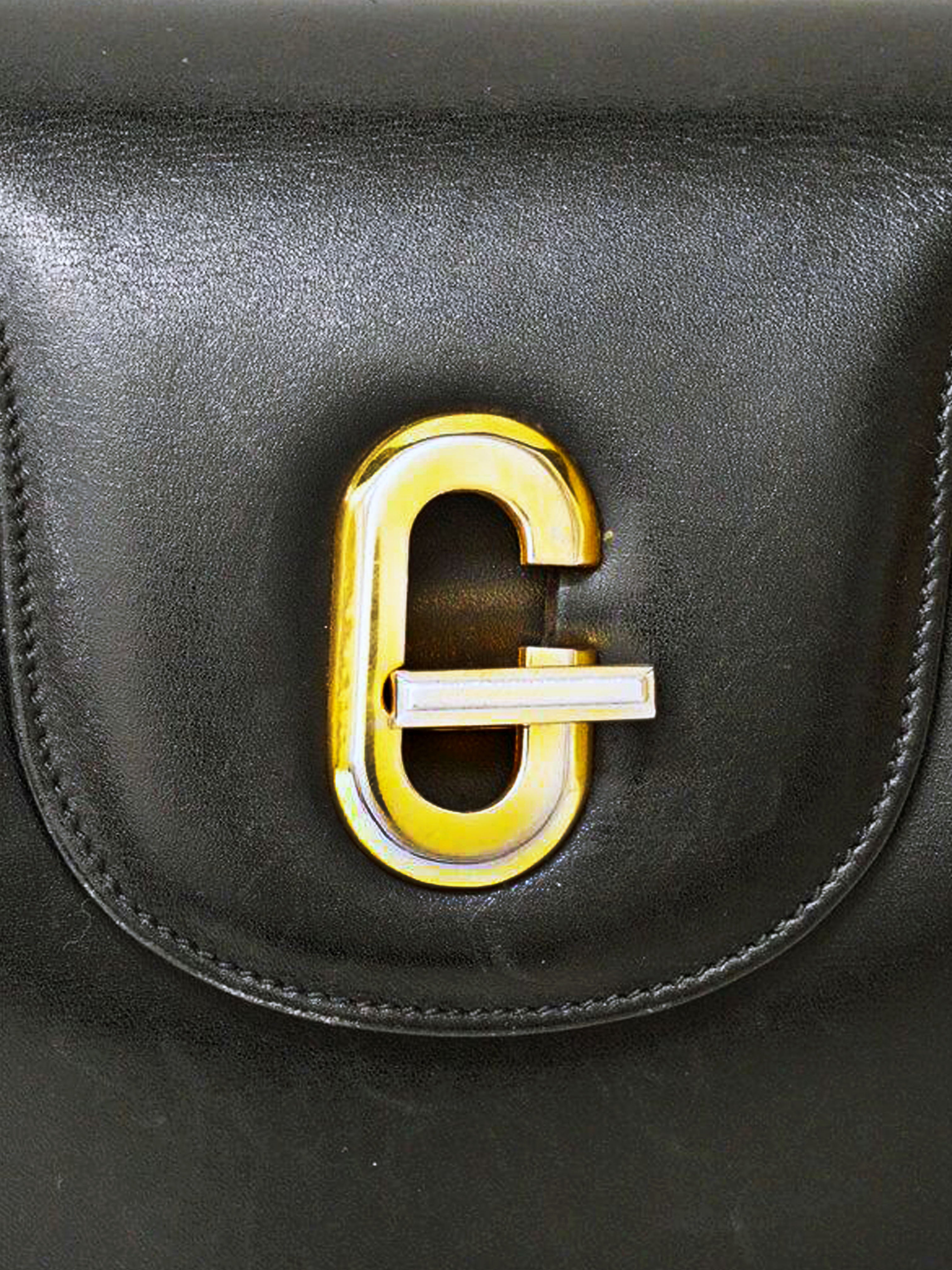 Gucci 1970s G Metal Leather Hand Bag · INTO