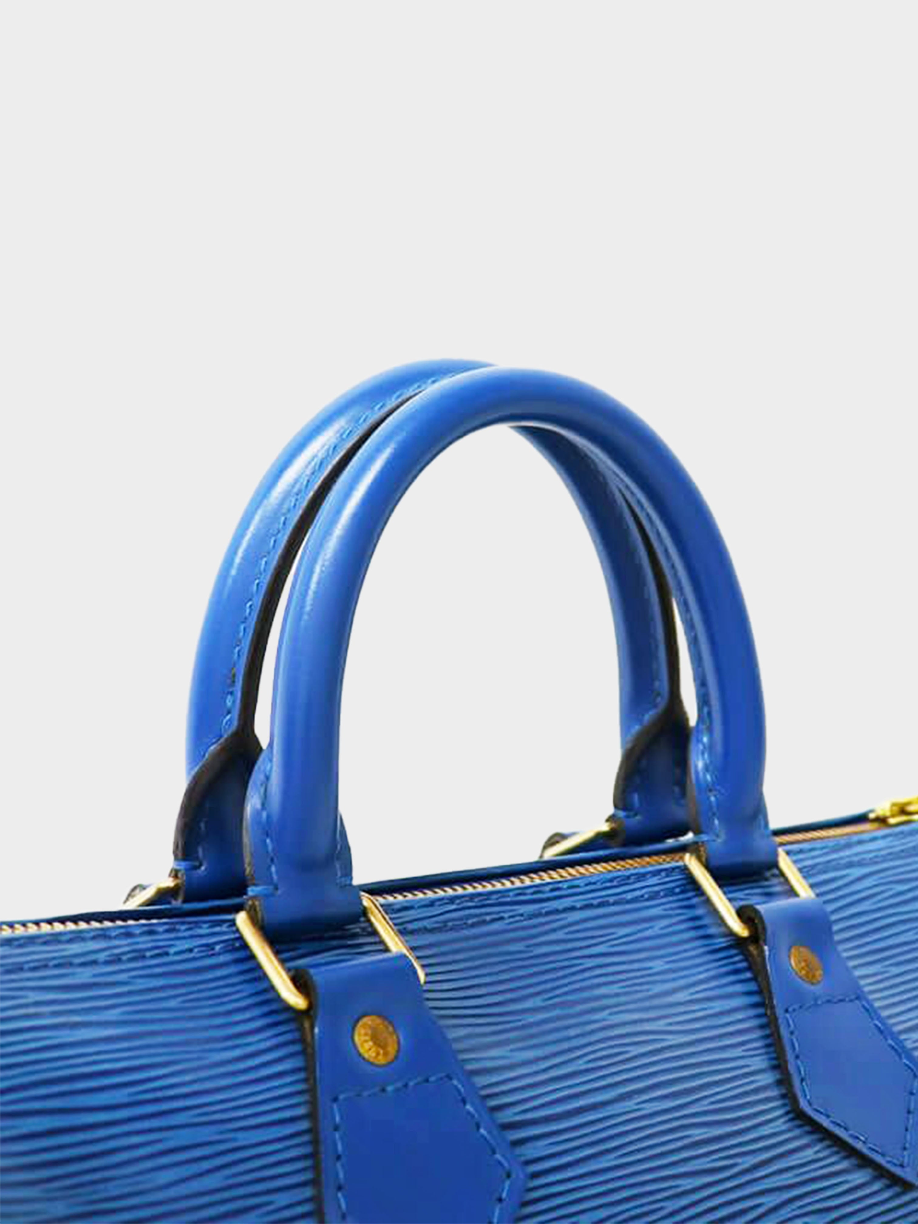 Louis Vuitton 1995 Blue Epi Speedy 25 Handbag · INTO