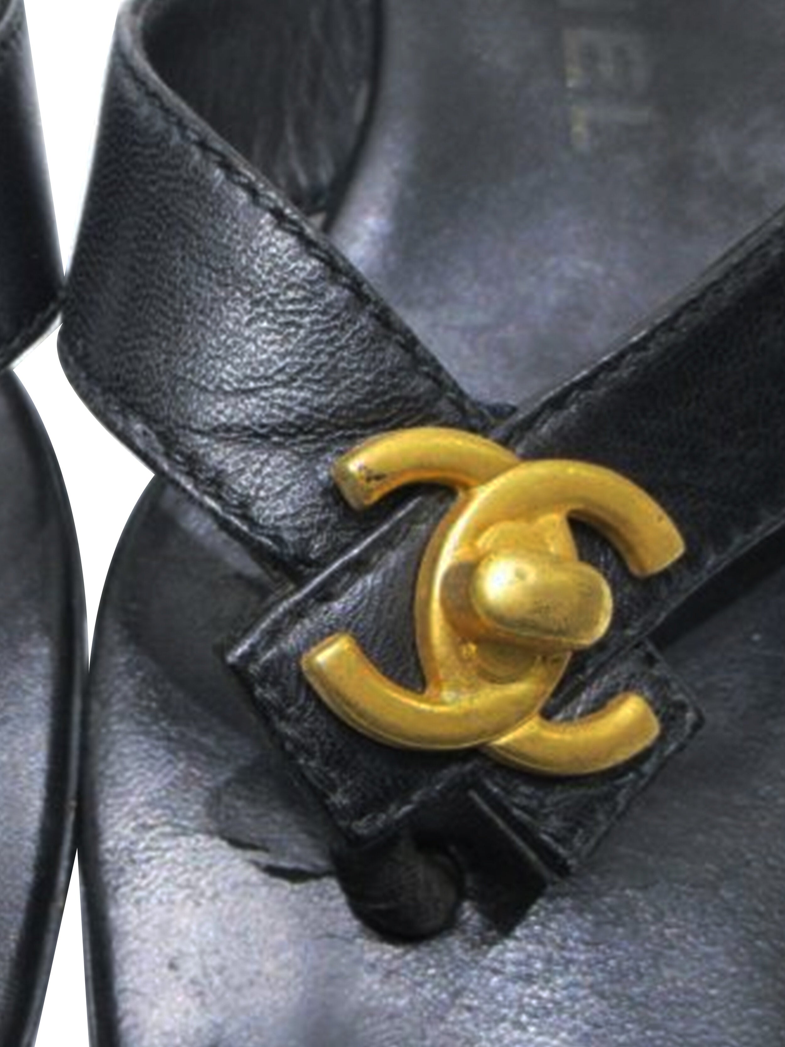 Chanel 2000s Black Leather Flip Flops · INTO