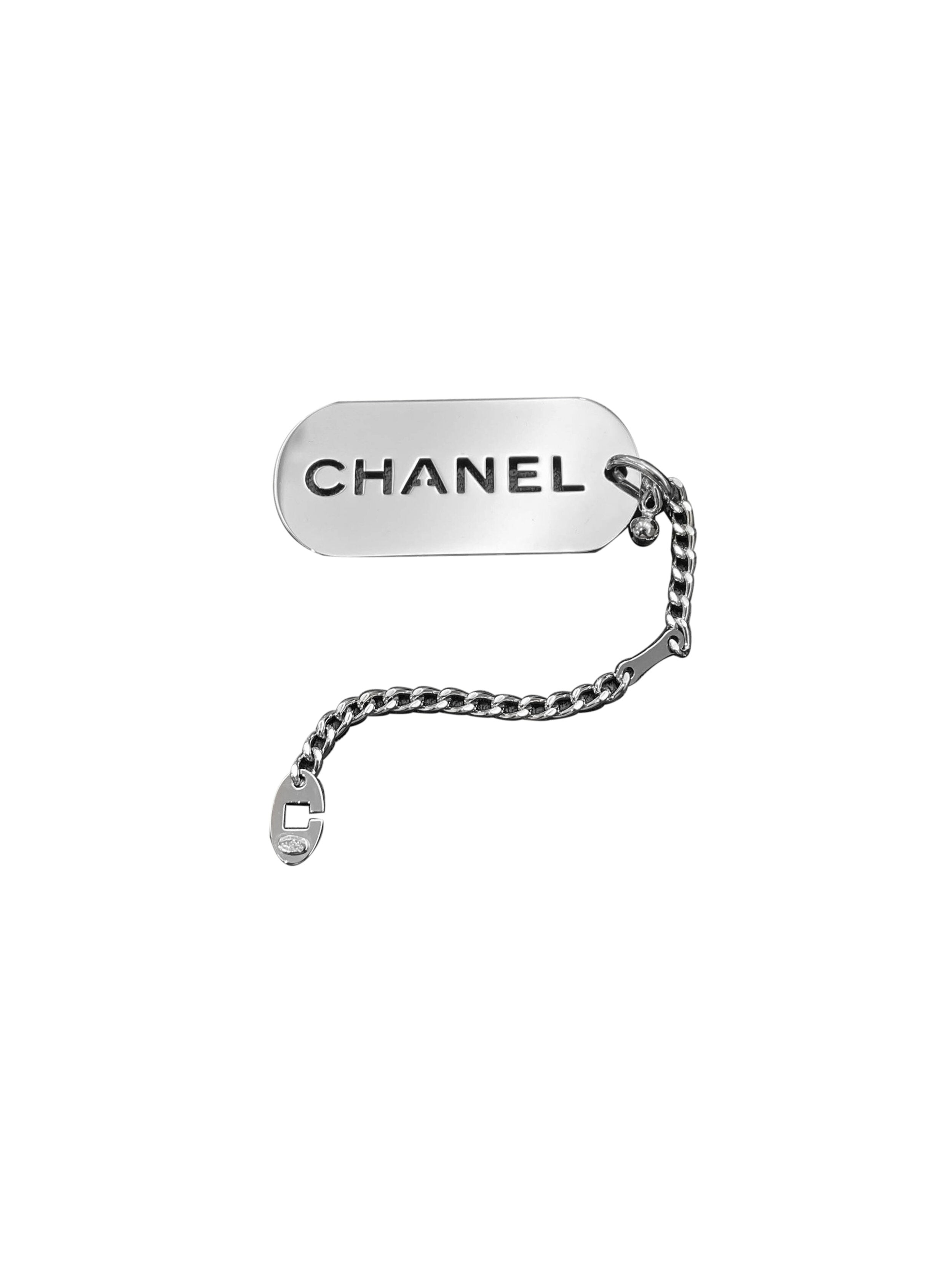 Chanel Silver Tag Keychain Charm · INTO