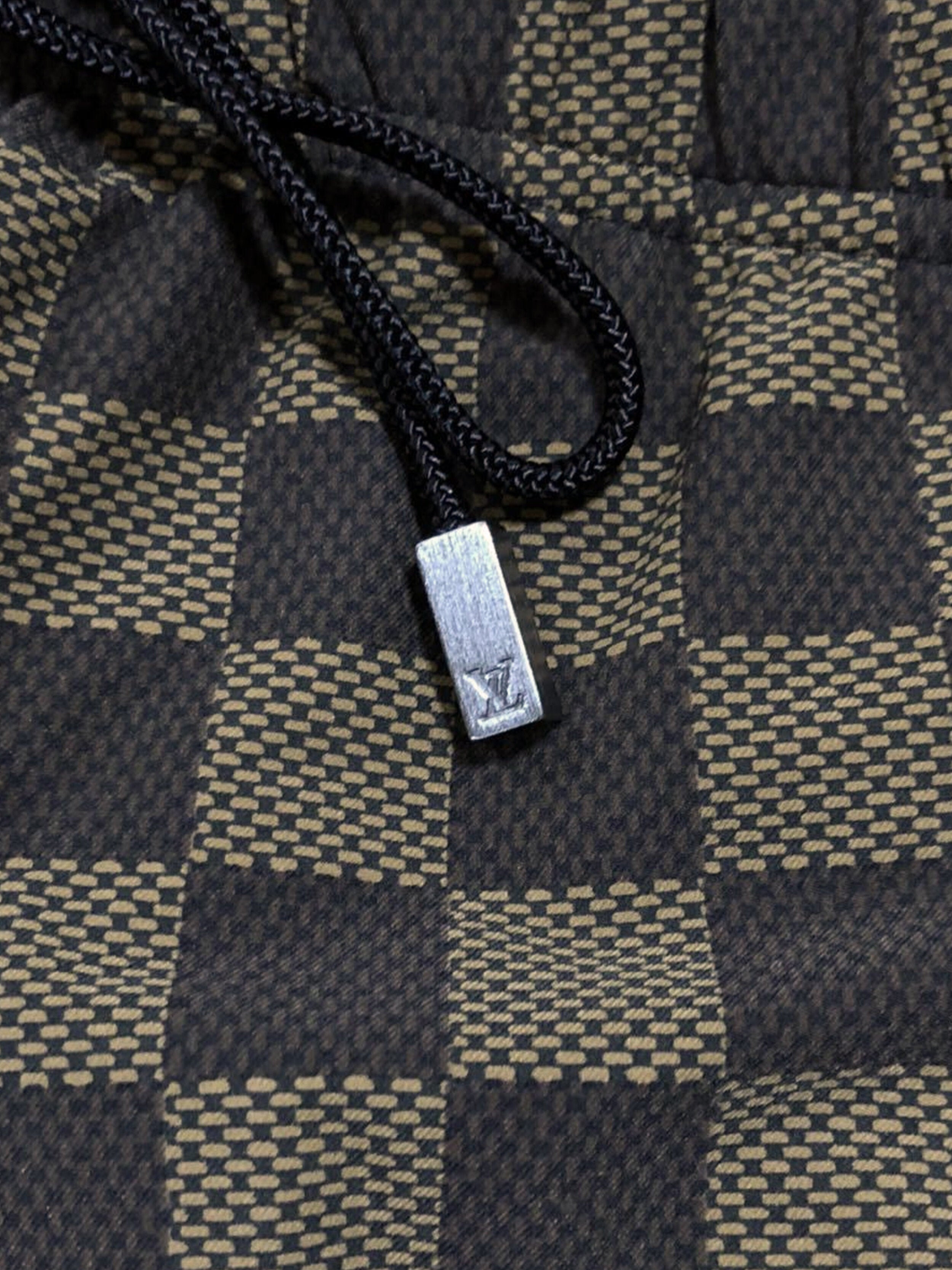 Louis Vuitton 2000s Damier Swim Bottoms · INTO