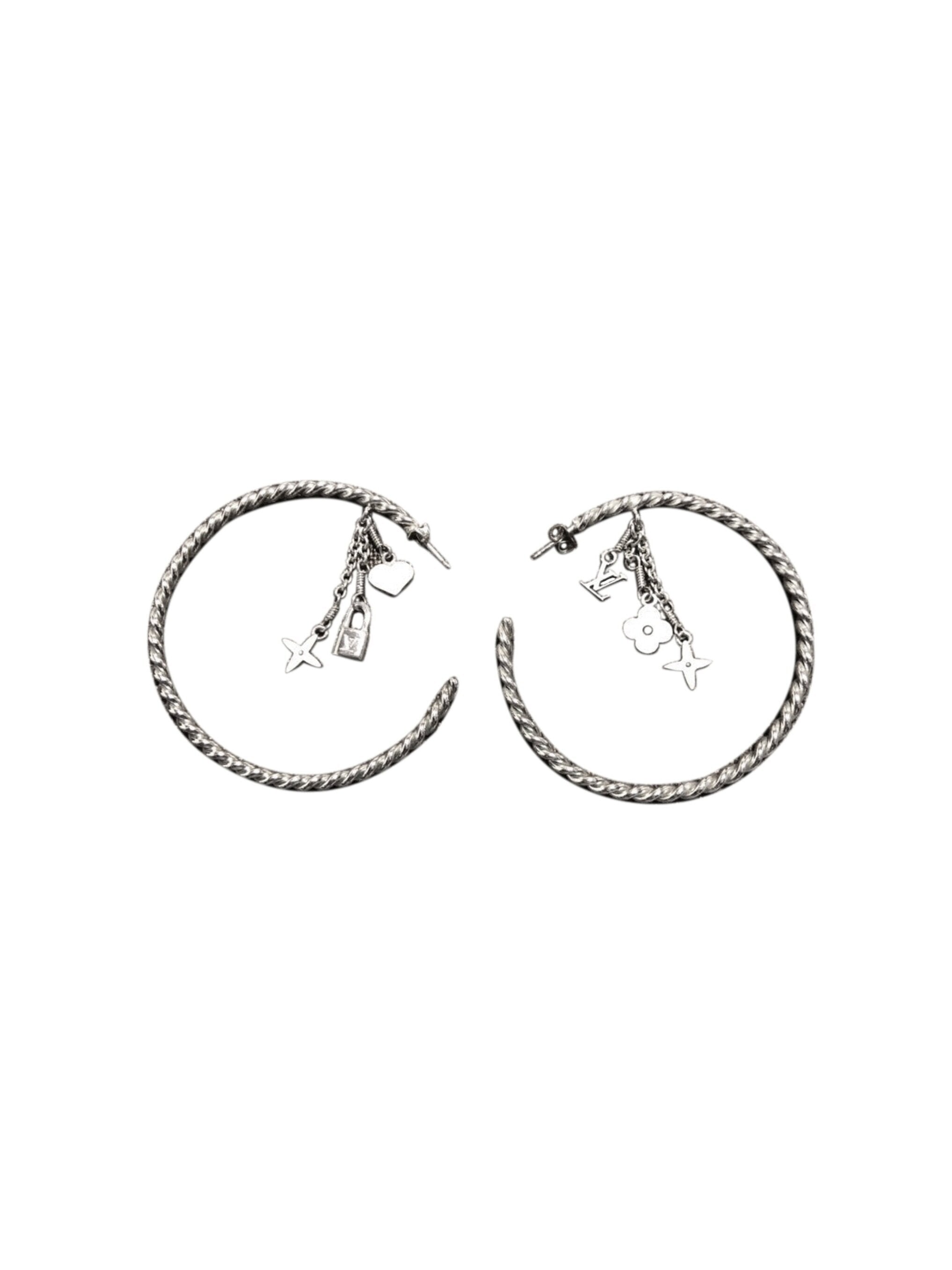 Louis Vuitton 2020 Silver Essential V Stud Earrings · INTO