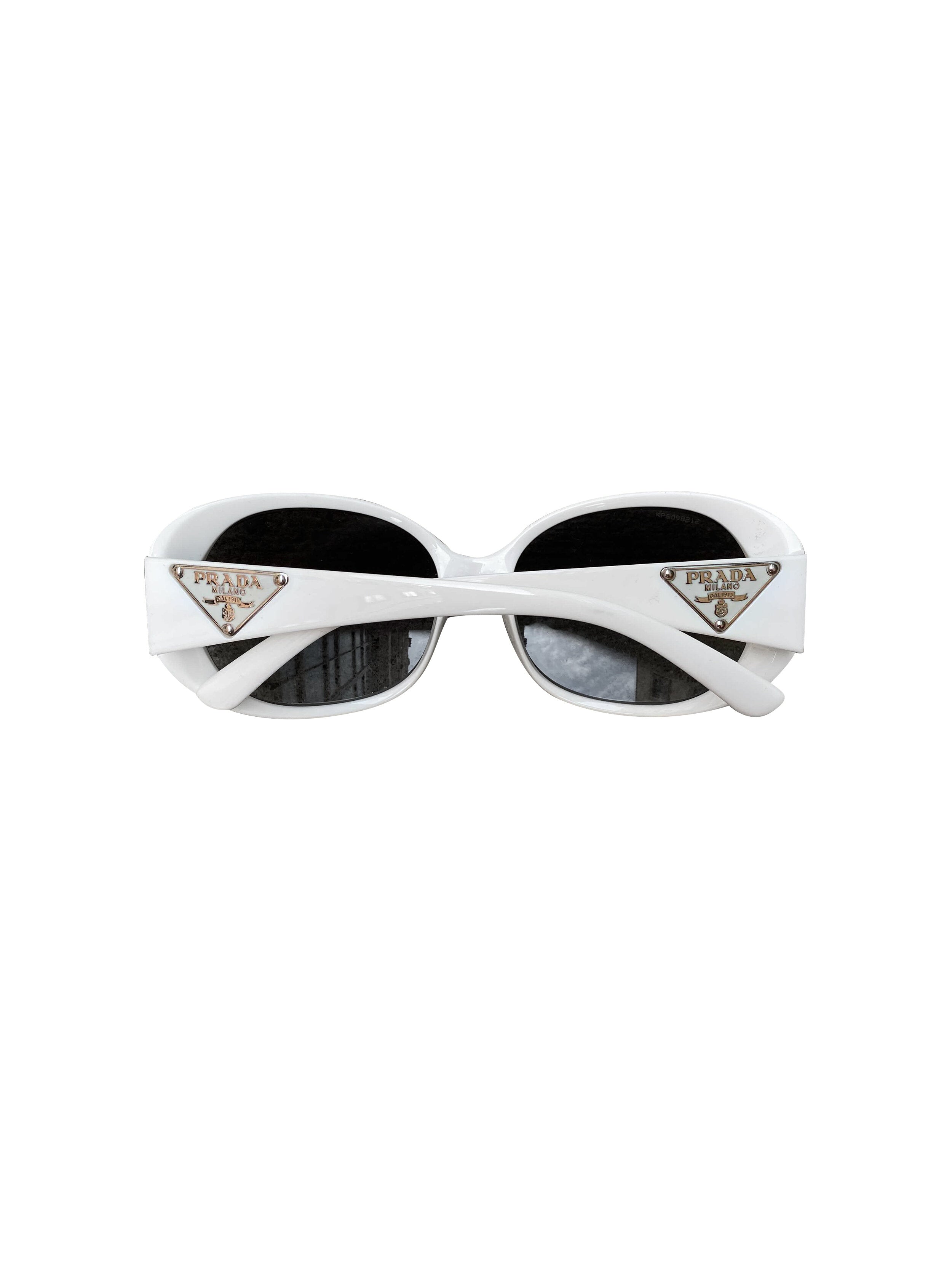 Prada Round Sunglasses in Gold | FWRD