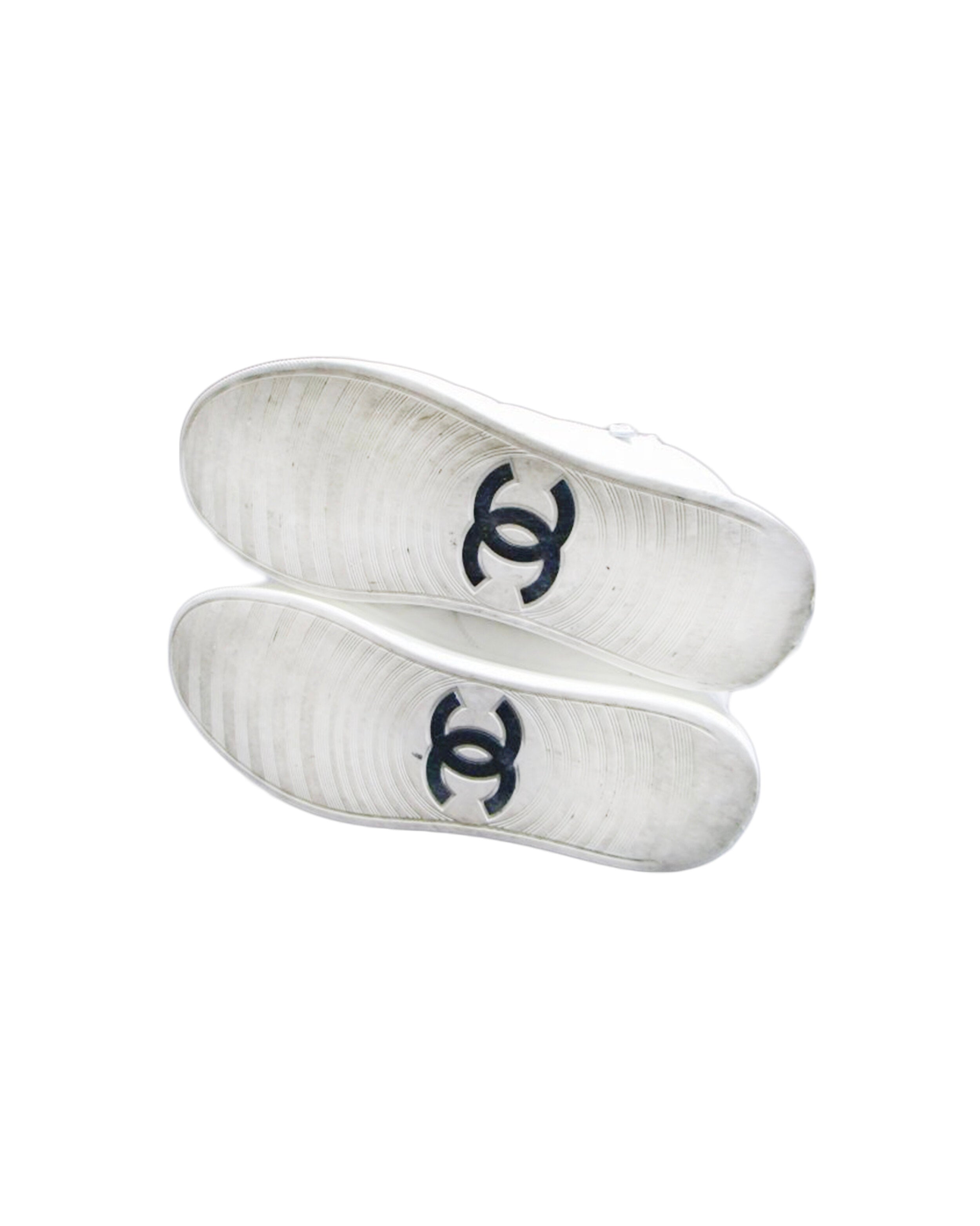 Chanel White High-Top Sneakers · INTO