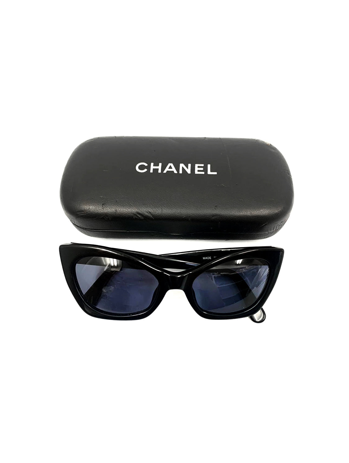 Vintage CHANEL black frame sunglasses with large CC charms at