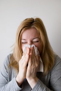 Sick Woman Sneezing