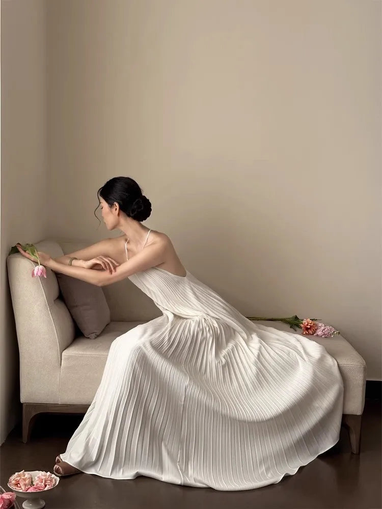 High-end white summer dress with pleated truffle back drape - Image 5