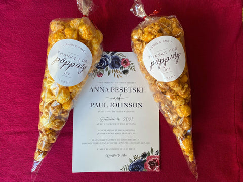 Anna and Paul wedding invitation with popcorn favors
