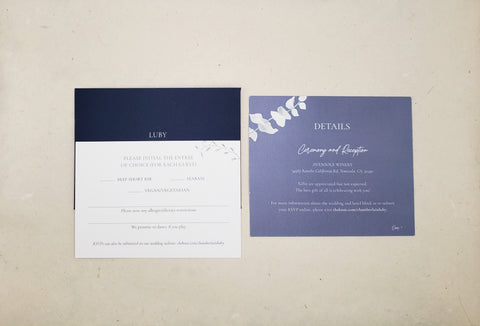 Navy blue reply envelope with white ink