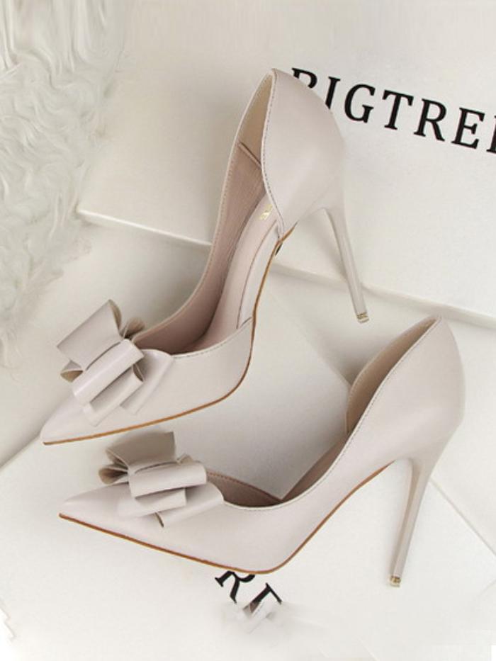 Fashionable bow-knot high-heeled stiletto shoes with shallow mouth and side cutout shoes