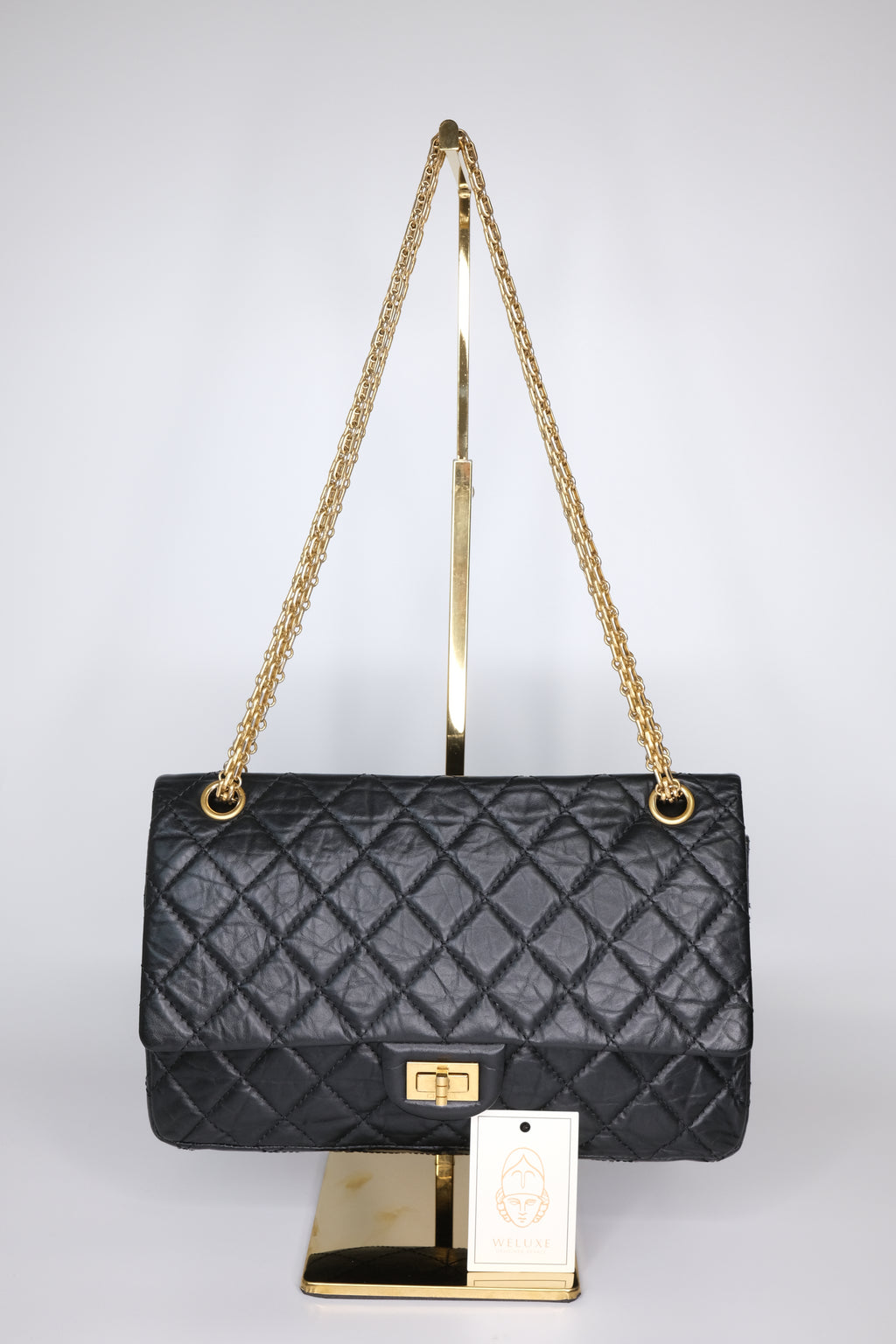 Chanel WOC black lambskin with gold hardware Microchips version – Weluxe  Designer Resale Inc.