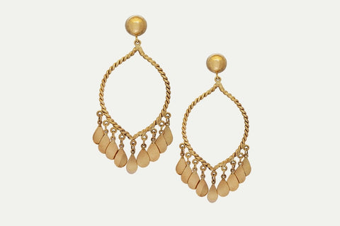 The Turner Earrings are an 18K yellow gold pair inspired by eastern designs