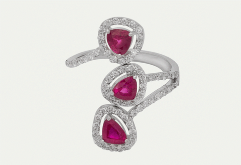 The Rouge Ring is a strikingly elegant ring made with 69 diamonds totaling 0.64 carats  and 3 Ruby Stones of 1.51 carats. This exquisite pattern is meticulously set in stones by our master craftsmen