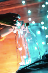 Glass bottles with string lights