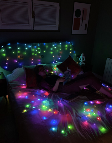 room inspo string lights on bedhead