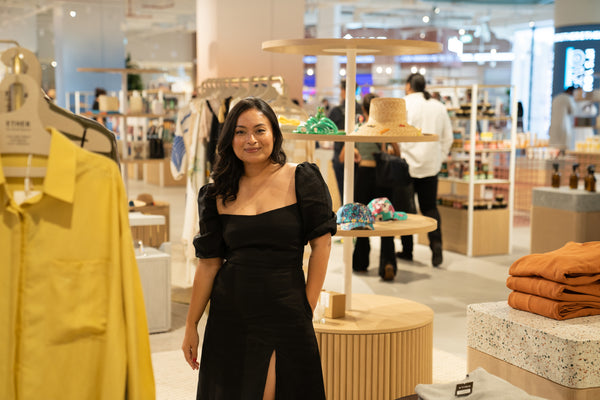 Founder of MY Label standing in the middle of her store at the opening of Ether, Yas Mall