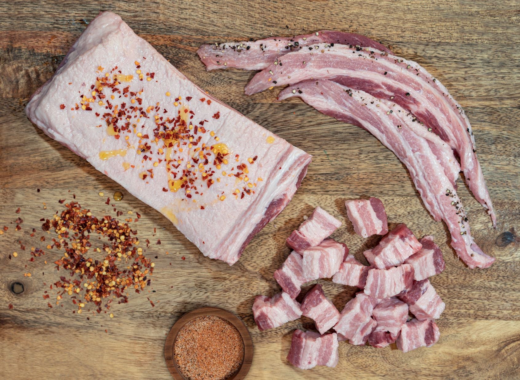 raw pork belly used for bacon, cubed pork, and much more from Barbecue At Home