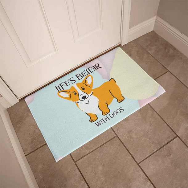 A rectangular welcome mat featuring a corgi and the phrase "Life's Better with Dogs".
