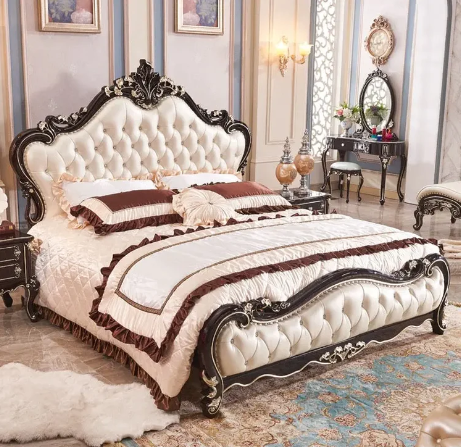 Create your ideal sanctuary with the X06 European Luxurious Black and White Tufted Rococo 7 Pieces Bedroom Set. Crafted in lavish Rococo style, this set exudes the opulence of European royal residences, while the black and white tufted design recalls the sophistication of classic French decor. The set includes seven luxurious pieces designed to create a harmonious bedroom ambiance: a sumptuous bed standing as the centerpiece, complemented by elegant nightstands, a dresser, a mirror, and a bench. Each piece is crafted with painstaking attention to detail, reflecting a masterful blend of traditional and contemporary design aesthetics. With its plush upholstery, ornate carvings, and superior craftsmanship, the X06 European Luxurious Black and White Tufted Rococo 7 Pieces Bedroom Set is more than just furniture - it's a statement of refinement and elegance. Turn your bedroom into your personal oasis of style and comfort with this extraordinary bedroom set.