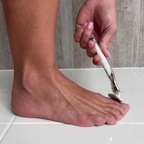 female shaving - toes