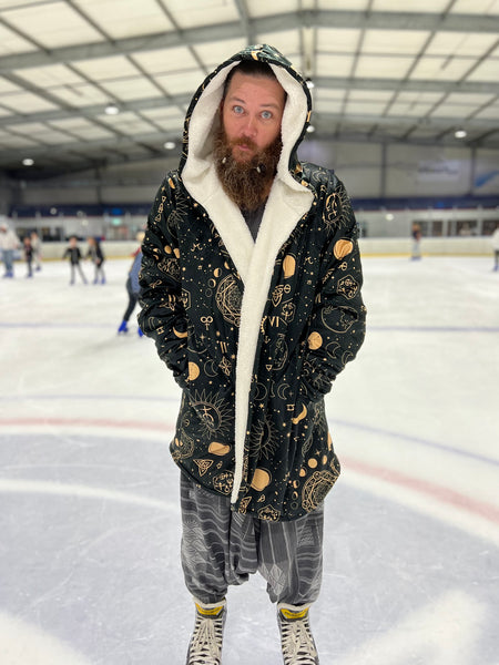 Ice skater wearing the Celestial Cloak at an Ice Skate Rink | Raiana's Vibes