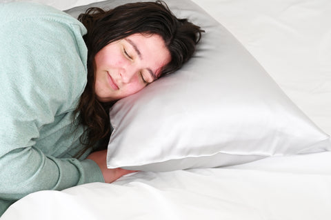 Girl sleeping on Skylark+Owl's Silk Pillowcase