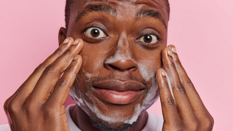 African American Model Washing Face with Soap