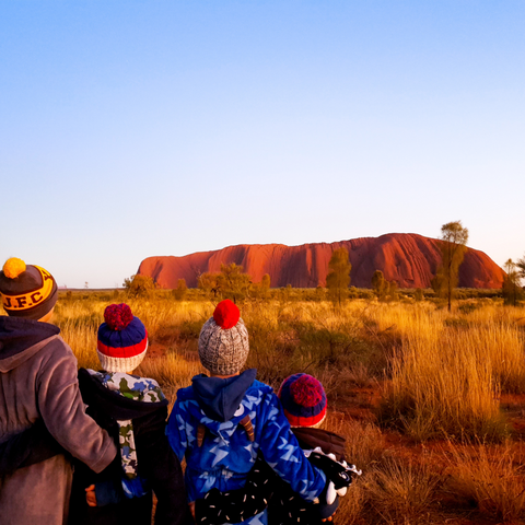 4boysandacarava infront of Uluru