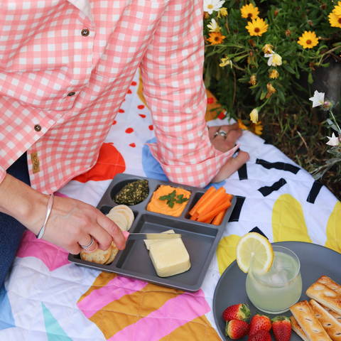 our bamboo dinnerware being used in an outdoor picnic