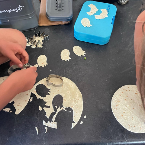 Make spooky crackers using cookie cutters and wraps