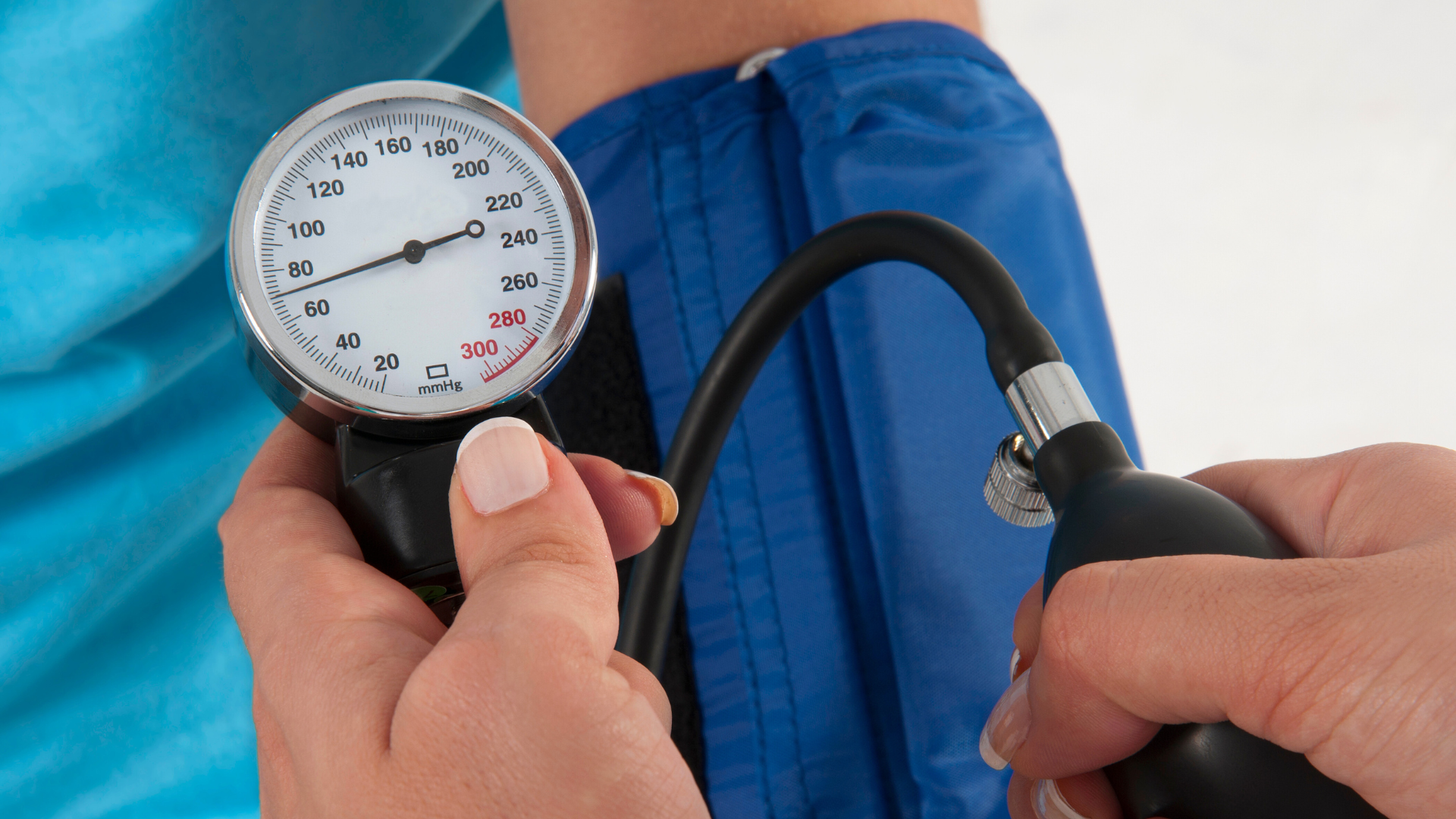 doctor checking blood preassure of the patient