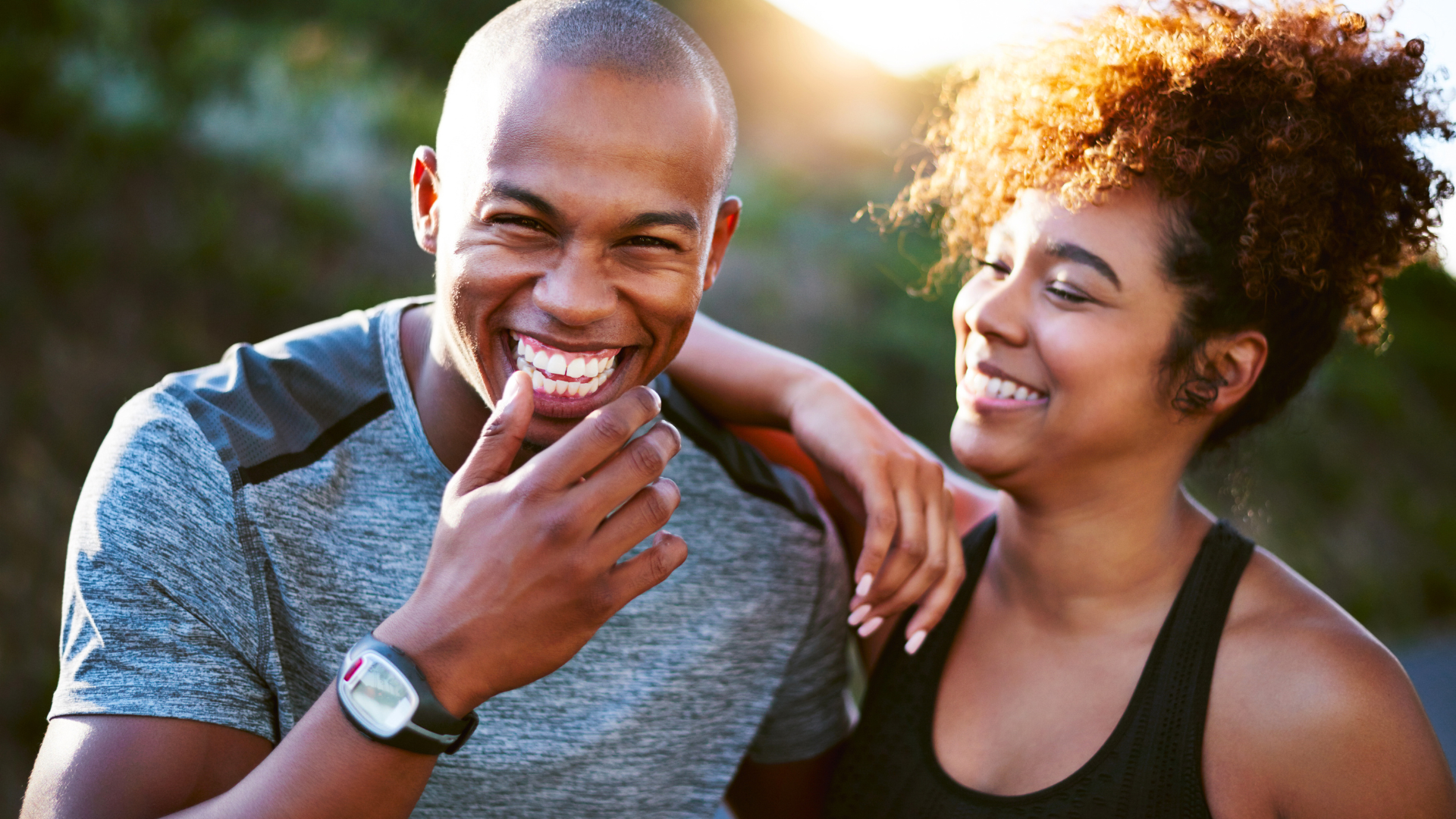 man and woman laughing