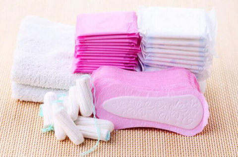 array of menstrual products including tampons and pads