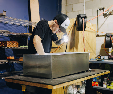 Ryan handcrafting a stainless steel Havens sink