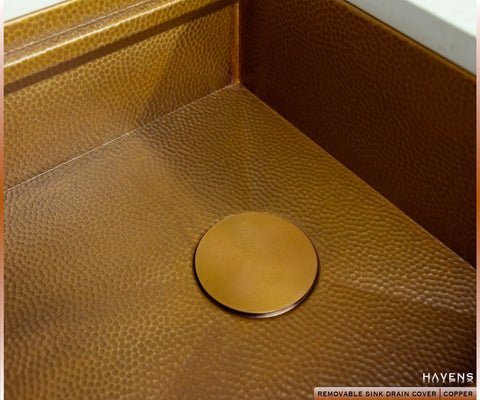 Kitchen sink drain cover in copper