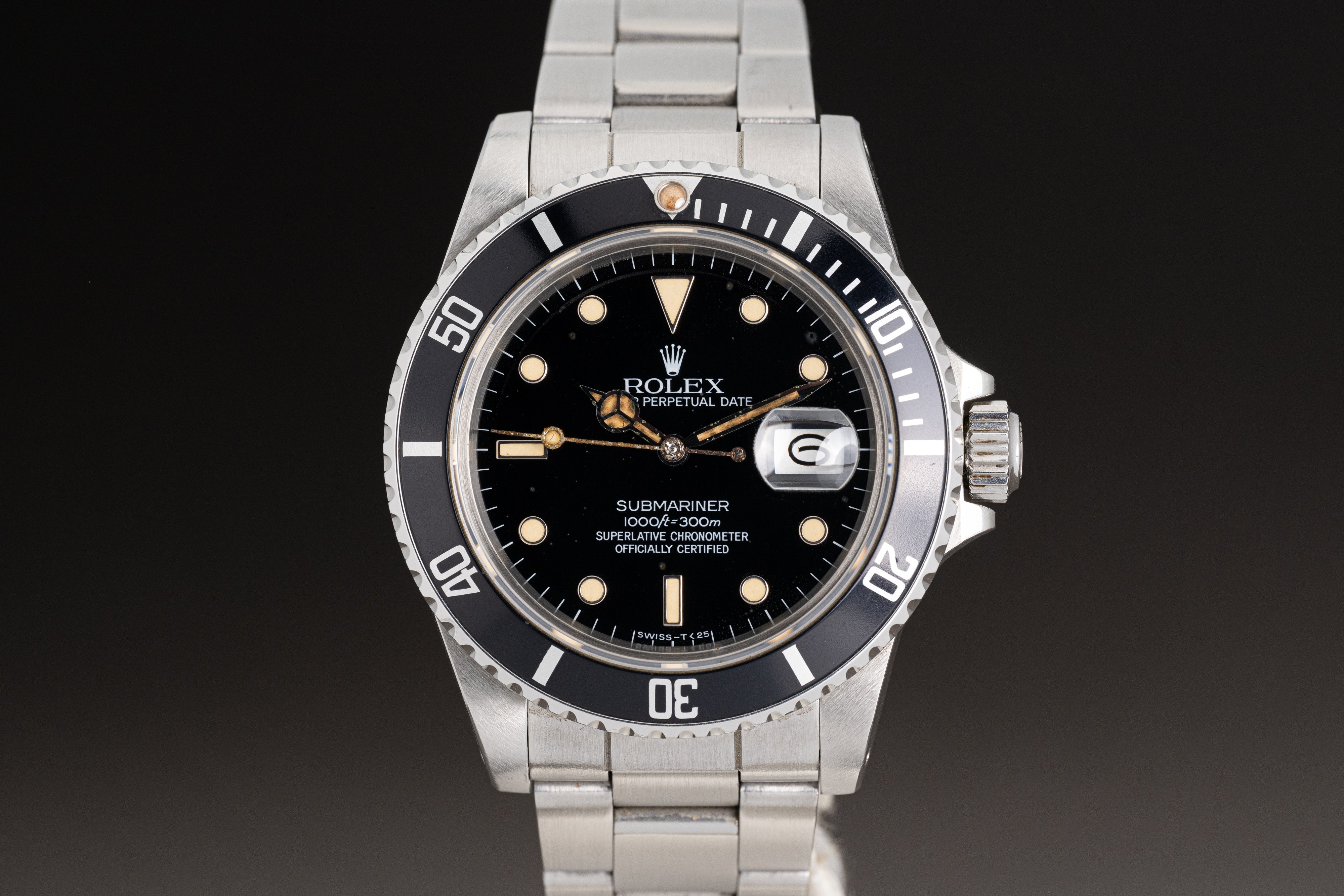 image of 1984 Rolex Submariner 16800 Glossy Dial White Gold Surround Markers Creamy Lume Plots & Hands