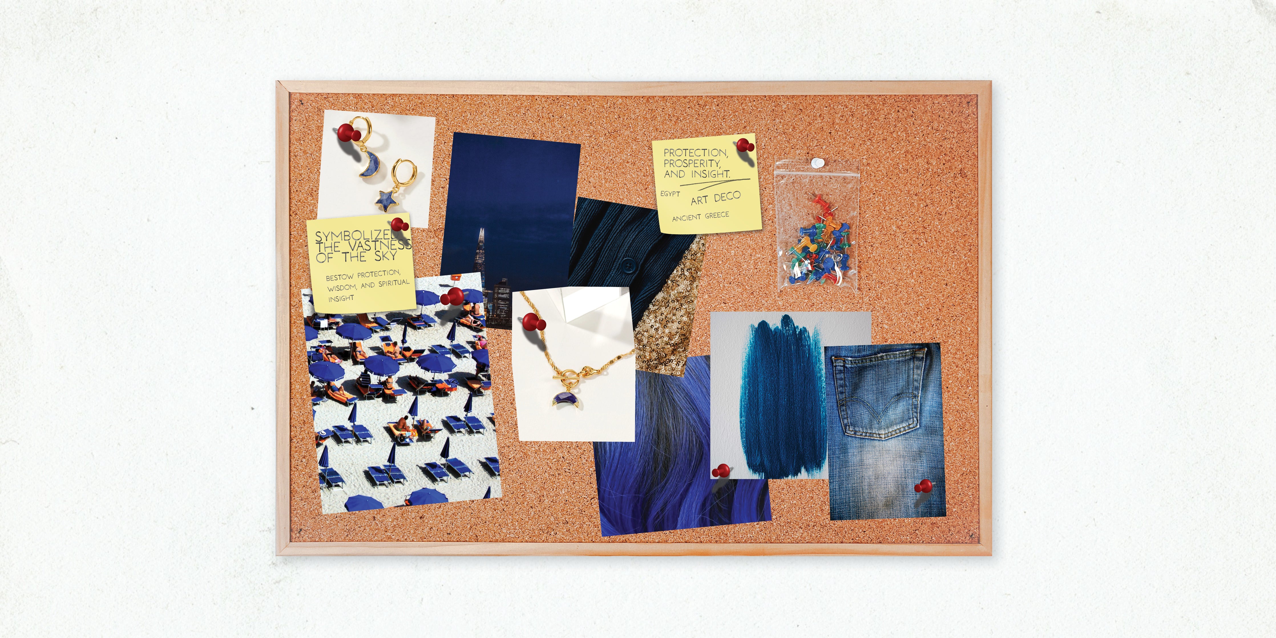 Image of a cork board with sticky notes pinned to it, pictures of denim, and pictures of sapphire moon-shaped jewelry
