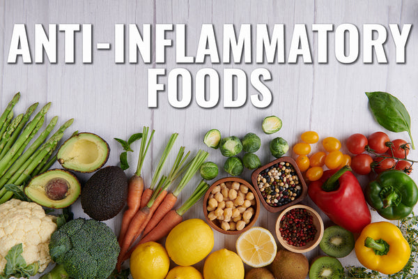 A table covered in vegetables, beans, nuts, and fruits at the bottom. Above it says "anti-inflammatory foods".