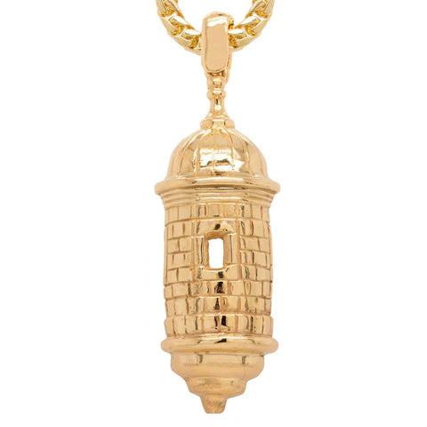 Gold tower shaped pendant on a white background