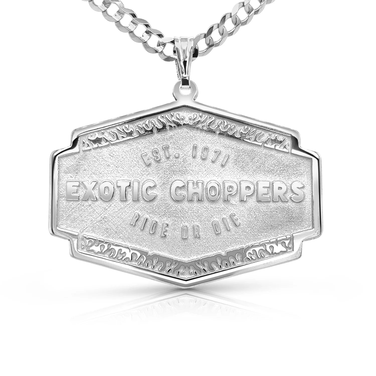 Silver engraved pendant  on a white background, pendant is of a store's logo