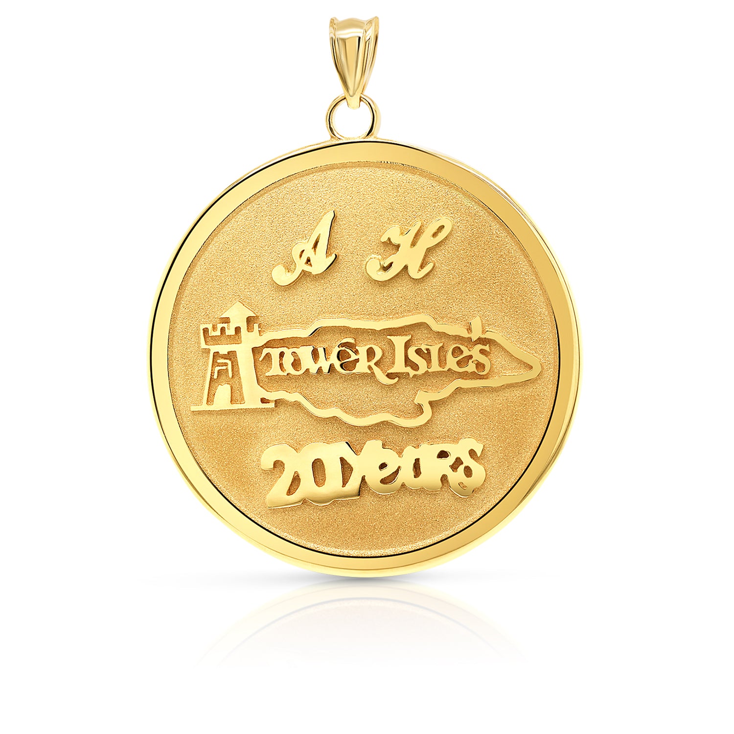 Gold round pendant with an engraved name on a white background