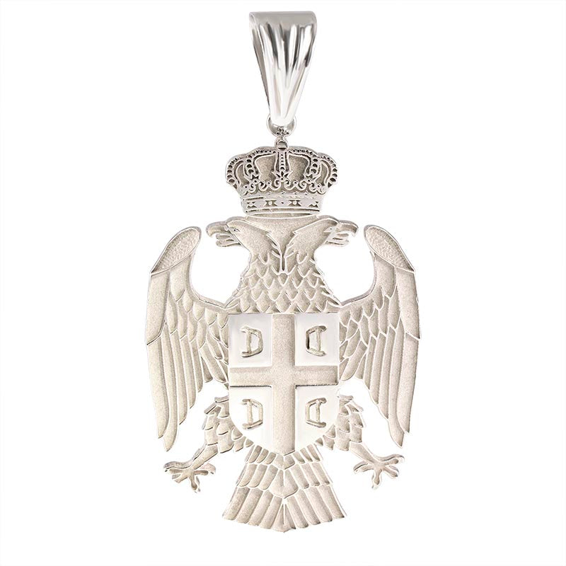 Silver heraldict eagle pendant on a white background