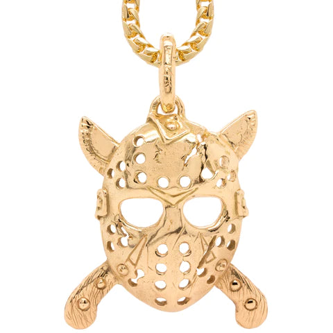 Gold mask pendant on a white background