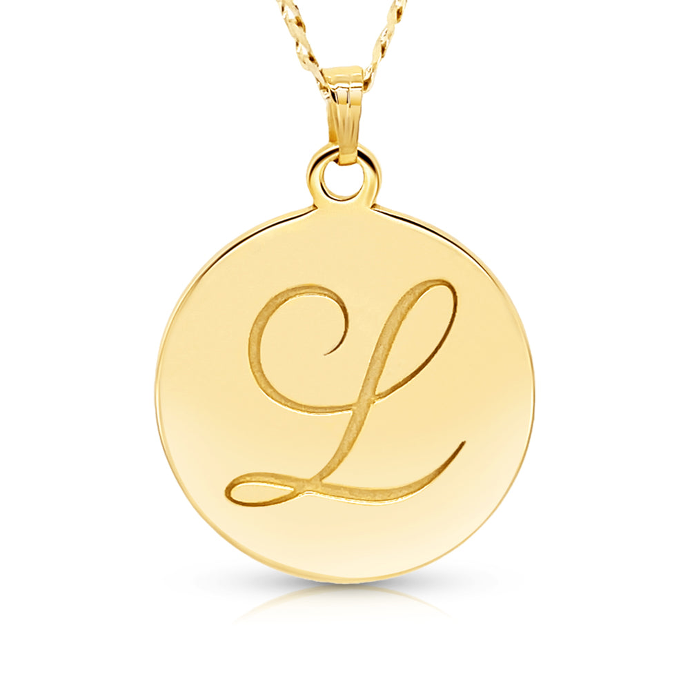 Gold round engraved pendant on a white background