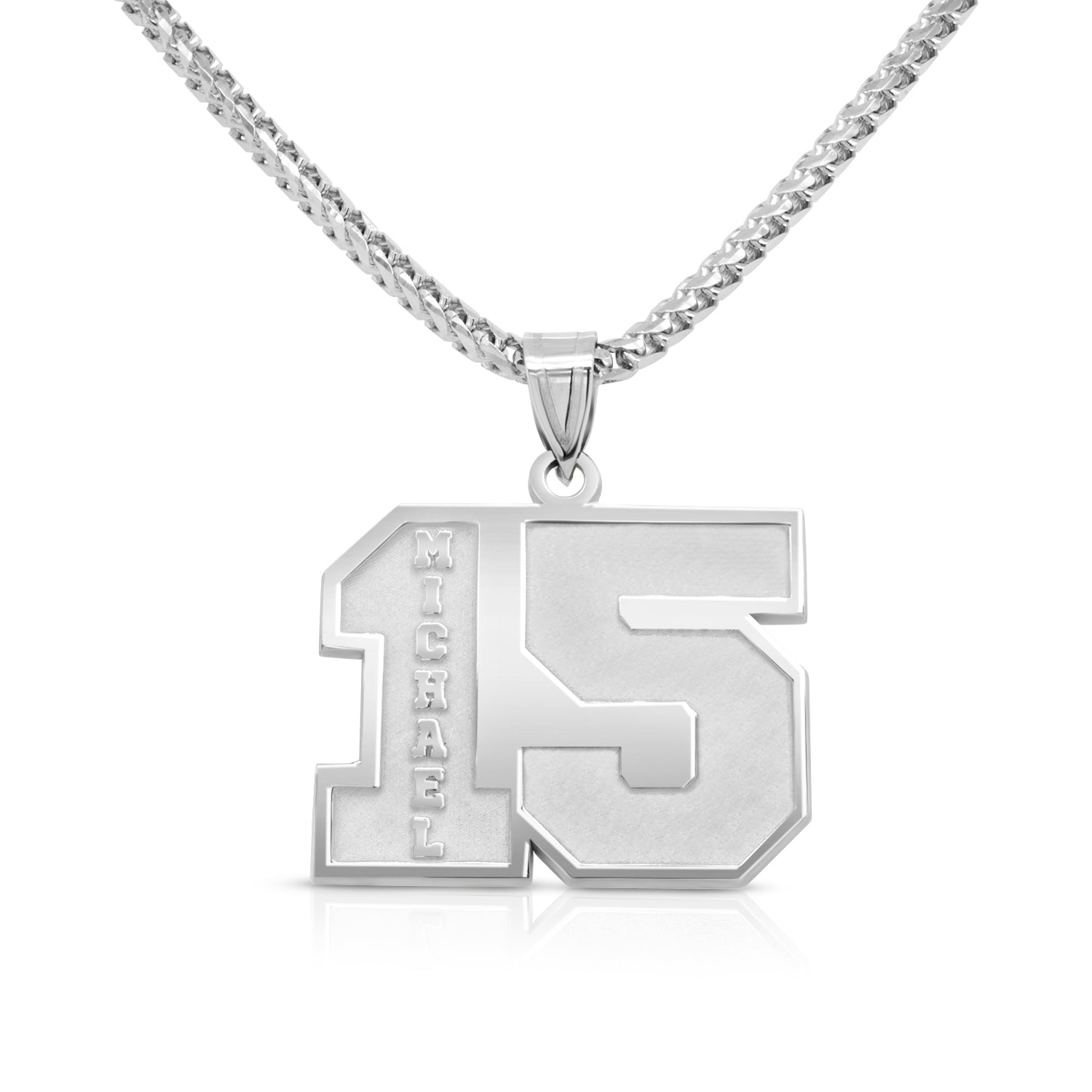 Silver numerical 15 pendant on a white background