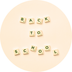 Image of Scrabble pieces that spell out Back To School